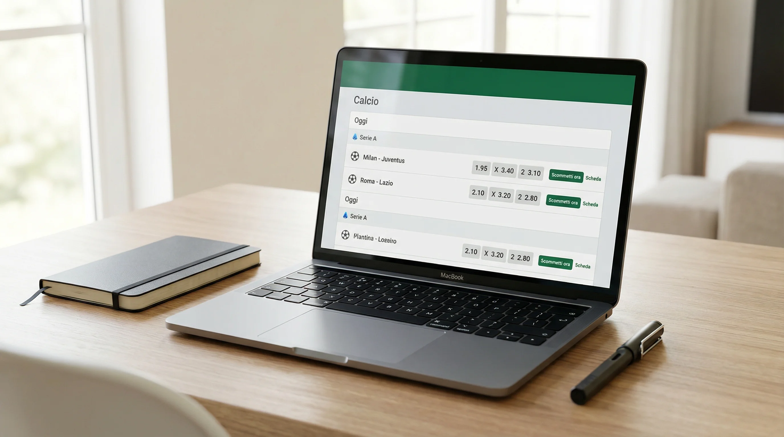 Schermo di laptop con sito di scommesse sportive su una scrivania ordinata